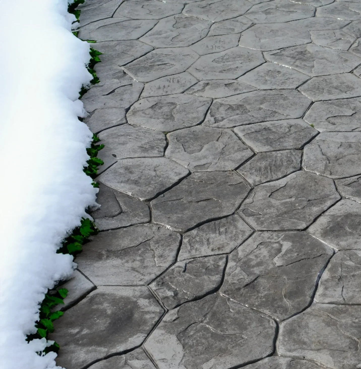 Grey stamped concrete electric heated driveway